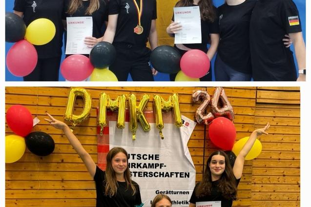 Gruppenbild von vier Sportlerinnen mit Medaille und Urkunden, umgeben von Luftballons in Schwarz, Rot und Gelb.