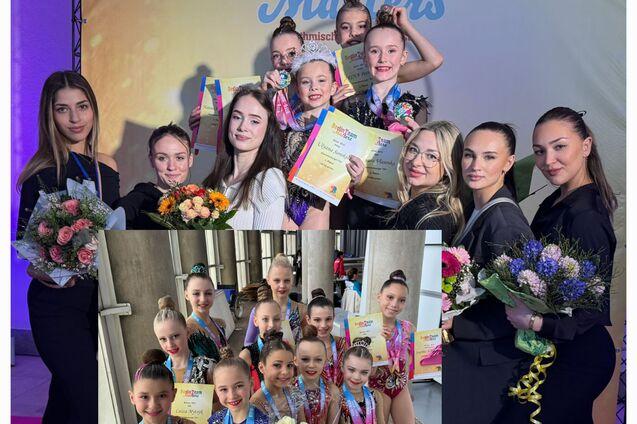 Gruppenbild von Tänzerinnen mit Medaillen, Urkunden und Blumen, aufgenommen beim Berlin Team Masters Event.