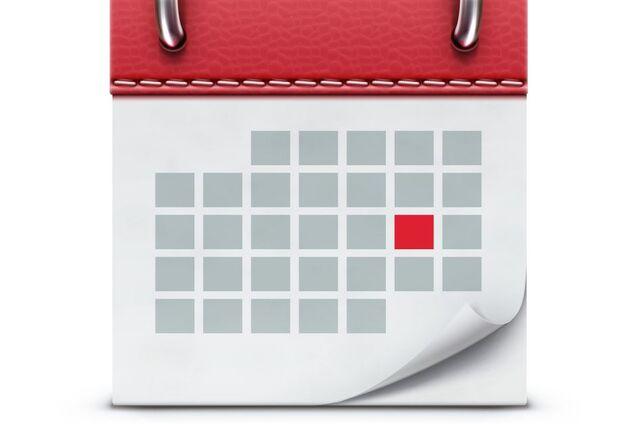 Digitaler Kalender mit roten Markierung auf einem bestimmten Datum, graue Kästchen auf weißem Hintergrund.