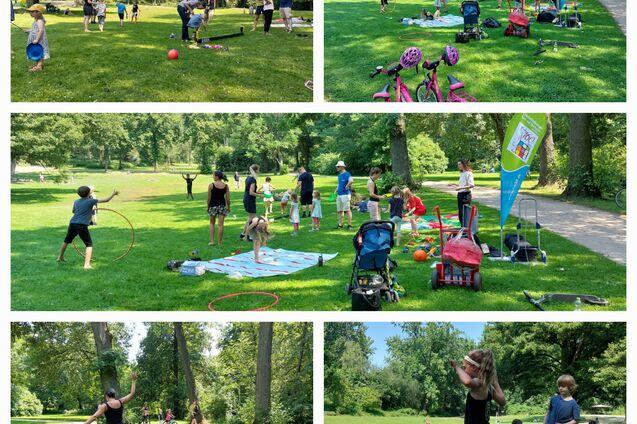 Gruppenspiele und Aktivitäten im Park, Kinder mit Hula-Hoops, Bällen und Fahrrädern auf einer Wiese.