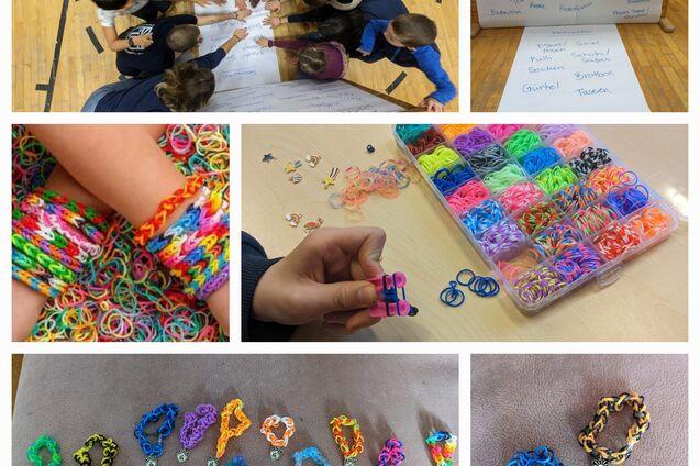 Kinder arbeiten zusammen an einem Projekt, während verschiedene bunte Gummibänder und Armbänder auf Tischen liegen.